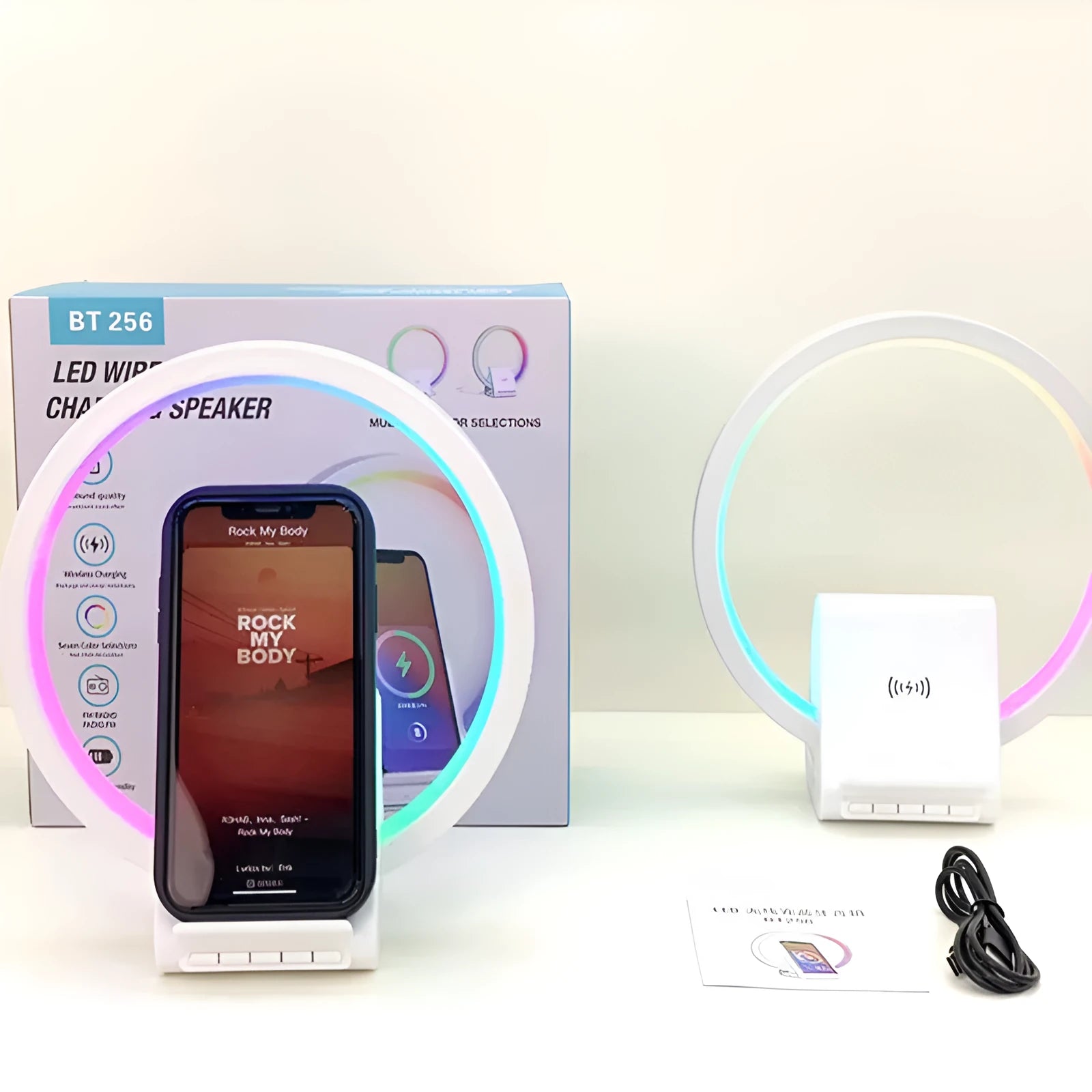 White circular smart Bluetooth speaker with wireless charging pad and ambient light, 225mm diameter