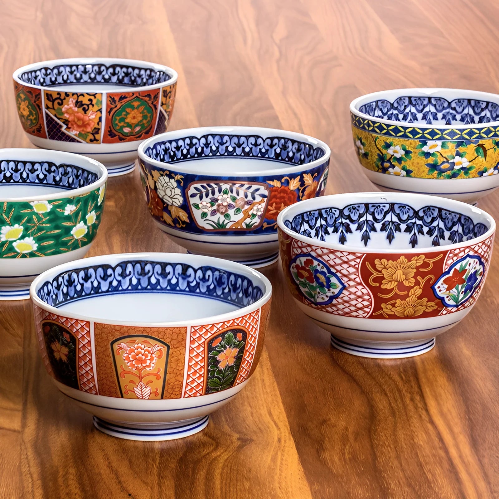 Retro Japanese style porcelain bowls with peony patterns in gold and yellow colours
