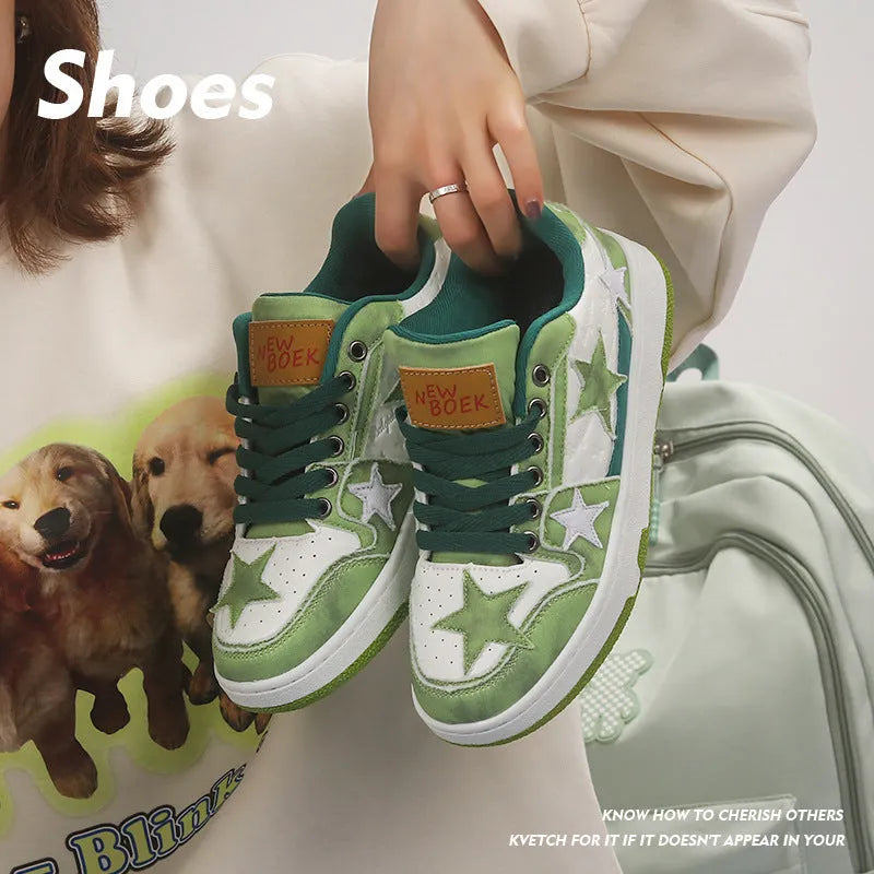 A pair of denim lace-up skate shoes with a rubber sole, shown in black, green, and pink colour options.