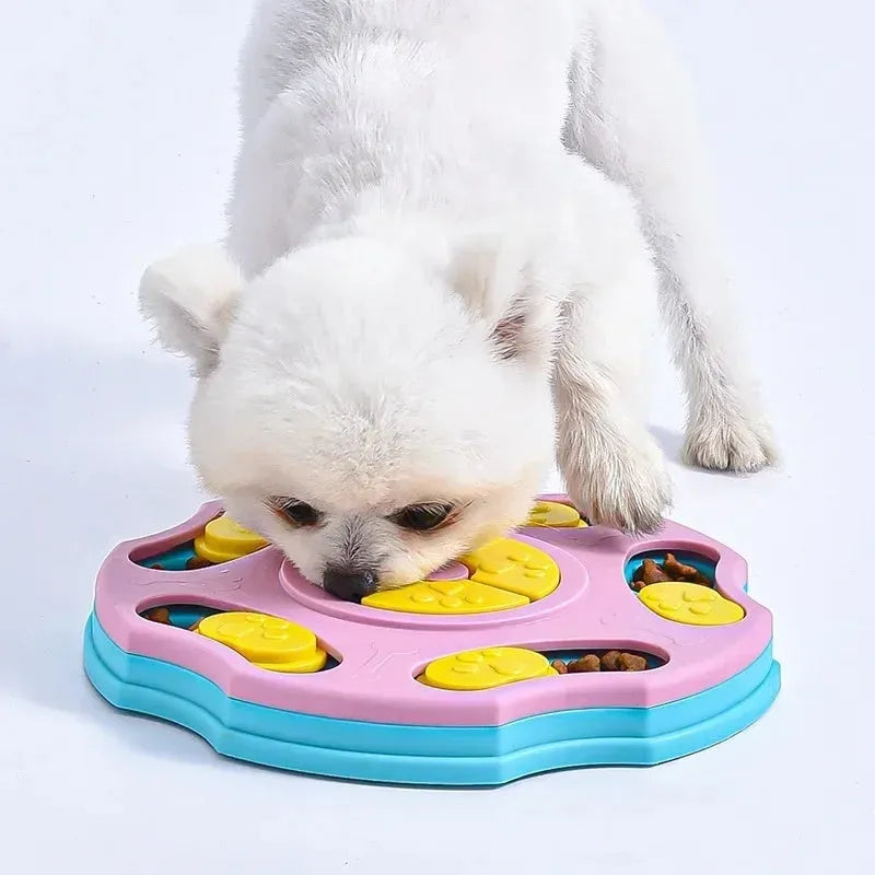 Blue and pink dog puzzle feeder toy with multiple compartments for interactive food searching gameplay