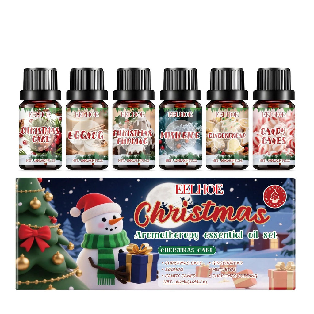 Christmas aromatherapy oil set showing 60ml warmer unit and six 10ml essential oil bottles