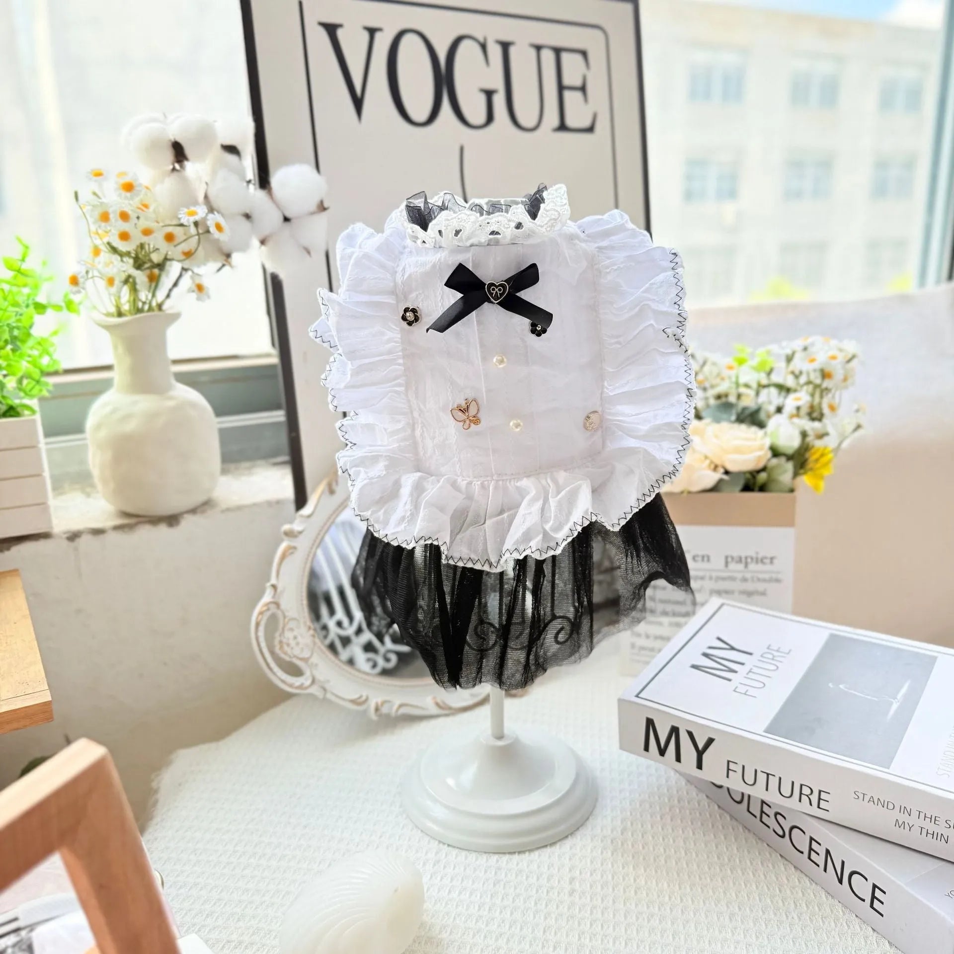 White polyester princess-style waltz gauze skirt for a small dog on a mannequin.