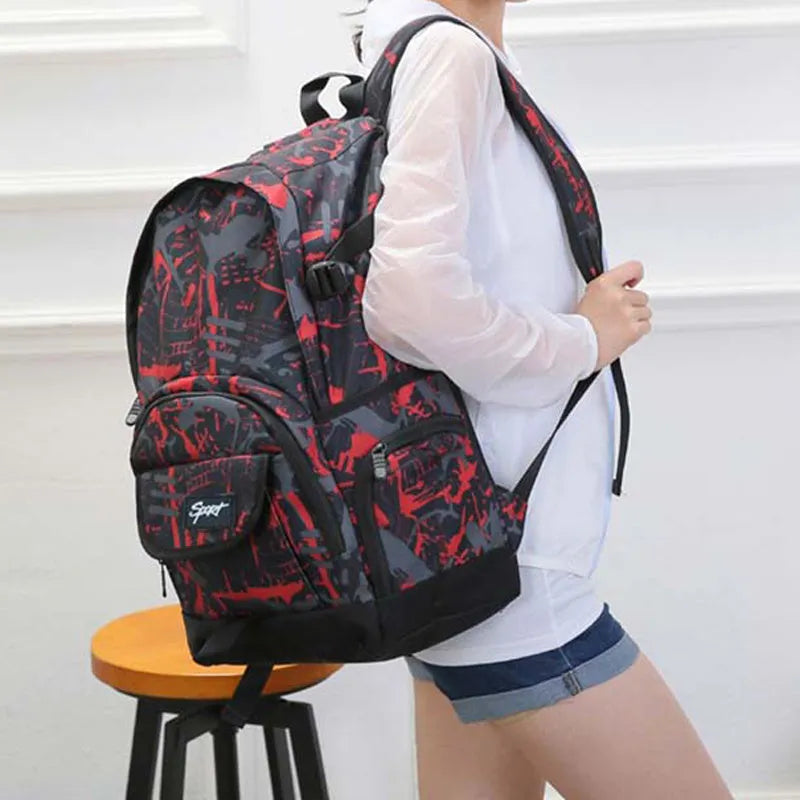 Blue and red classic nylon backpack with large capacity for school, travel, and outdoor use.