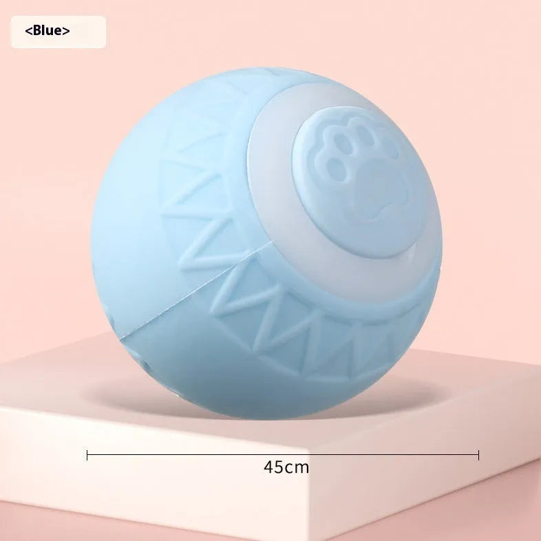 Blue automatic moving cat toy ball with USB charging cable on floor