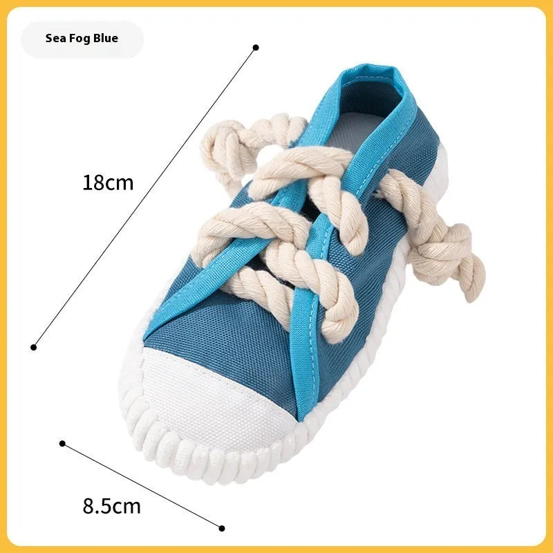 Plastic dog bite toy with bends in rock yellow, black, and sea fog blue colour options