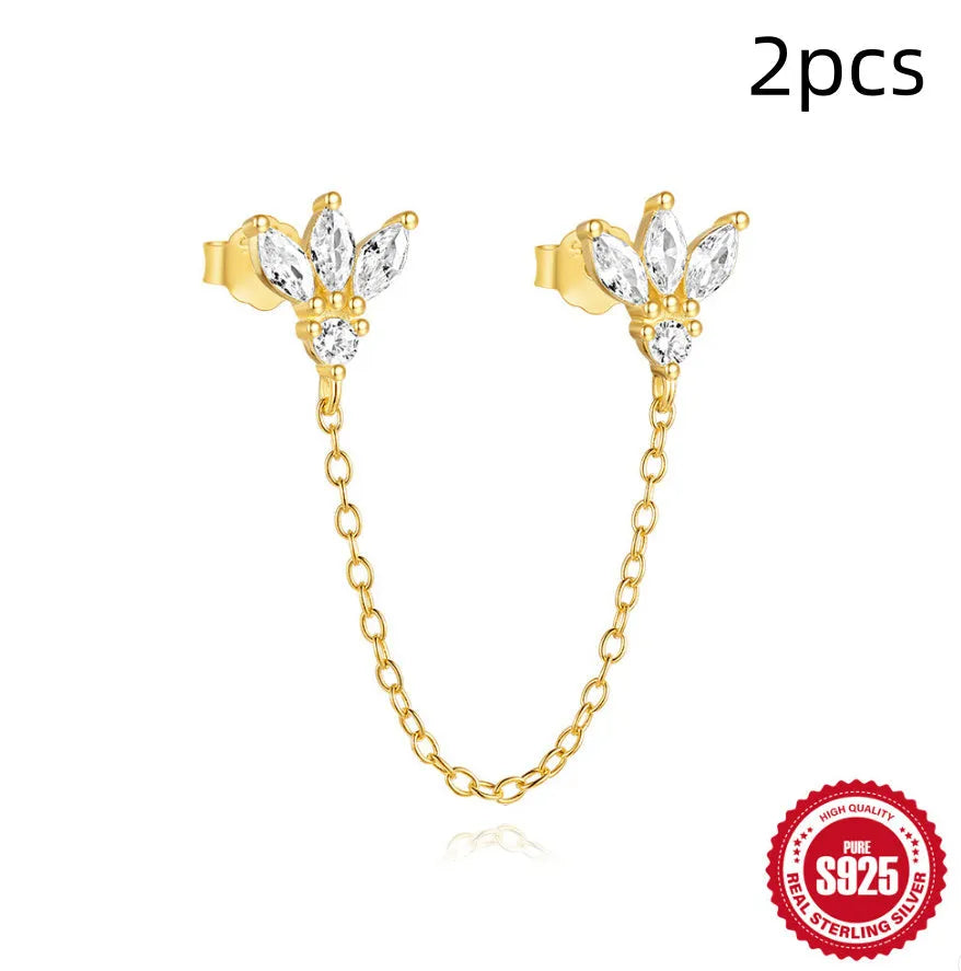 Golden geometric sterling silver earrings with zircon details for double piercings