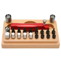 20-piece steel watch repair tool kit with extracting and opening tubes on a work surface.