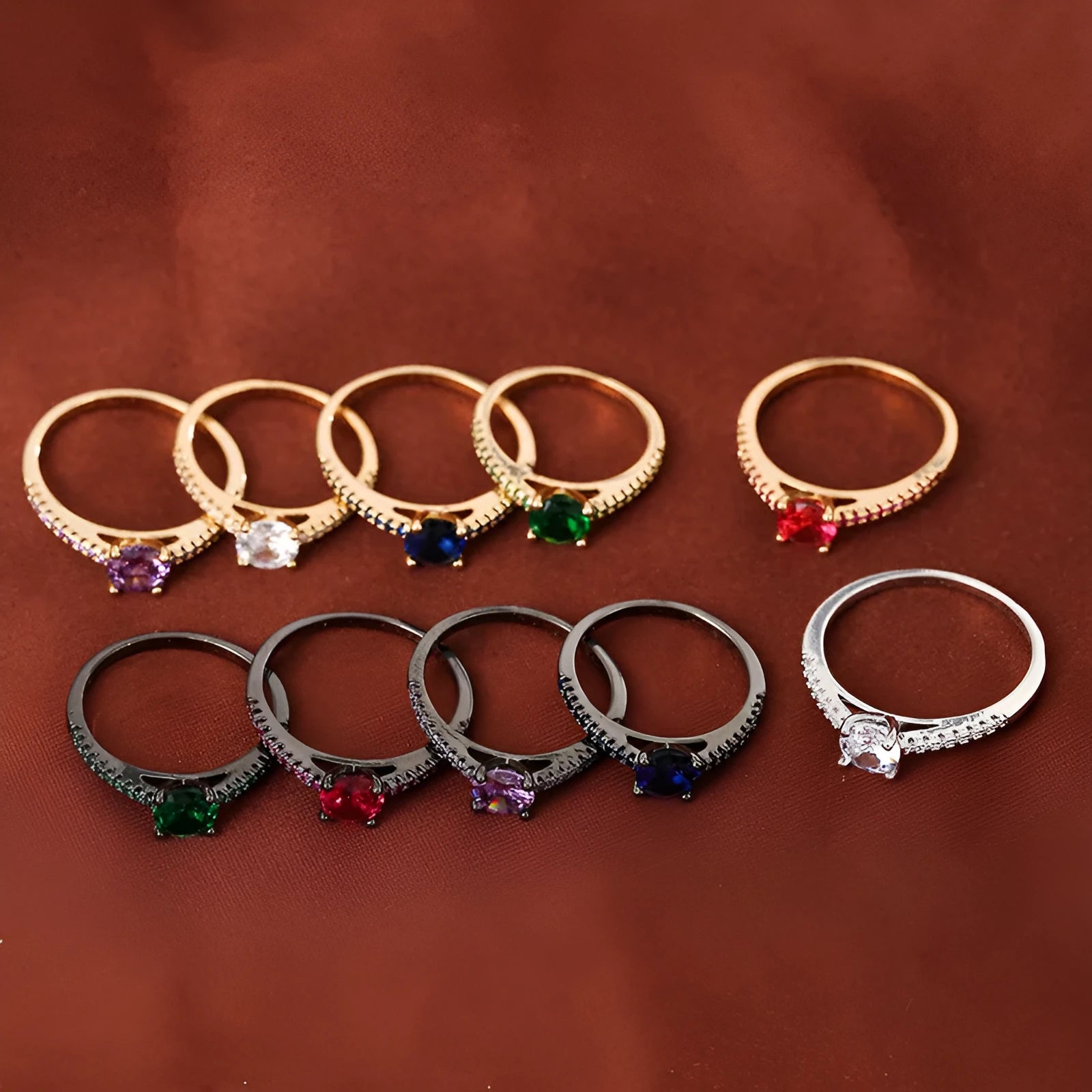 Geometric hexagon copper ring with colourful zircon stones in a metallic electroplated finish.