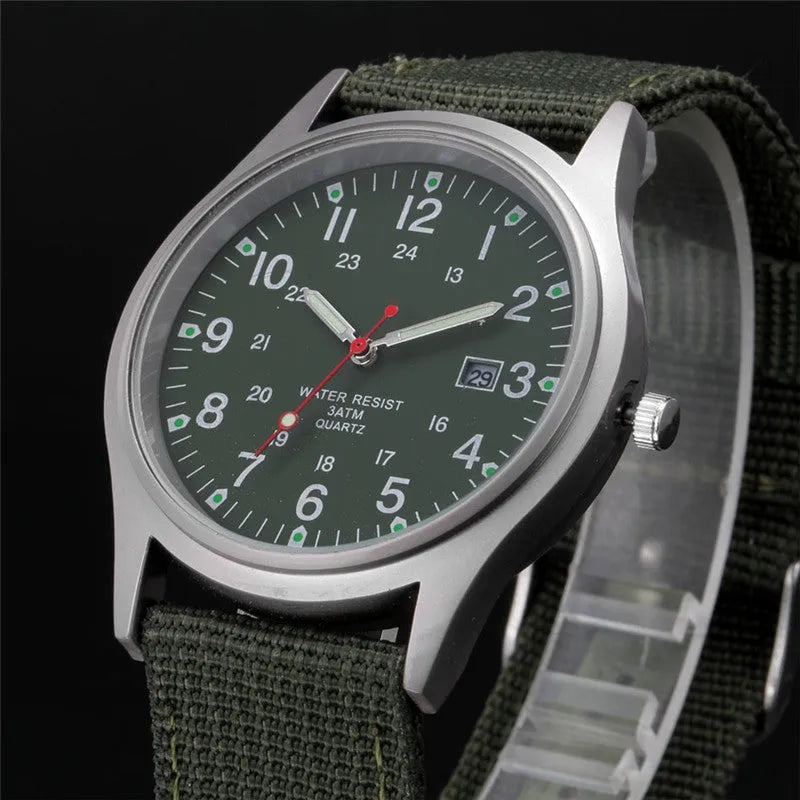Men's military-style fabric band watch with calendar display and black face