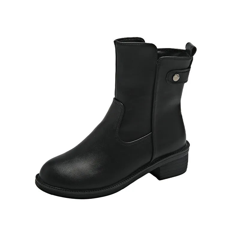 Black women's short ankle boots with a side zip, low heel, and round toe on a rubber sole.