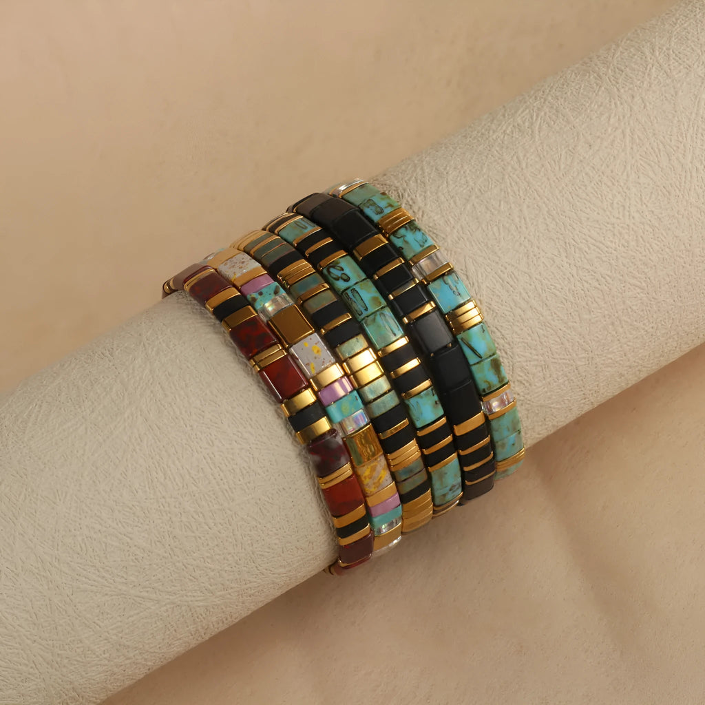 Glass and coloured glaze beaded bracelet with geometric round beads in five colour options