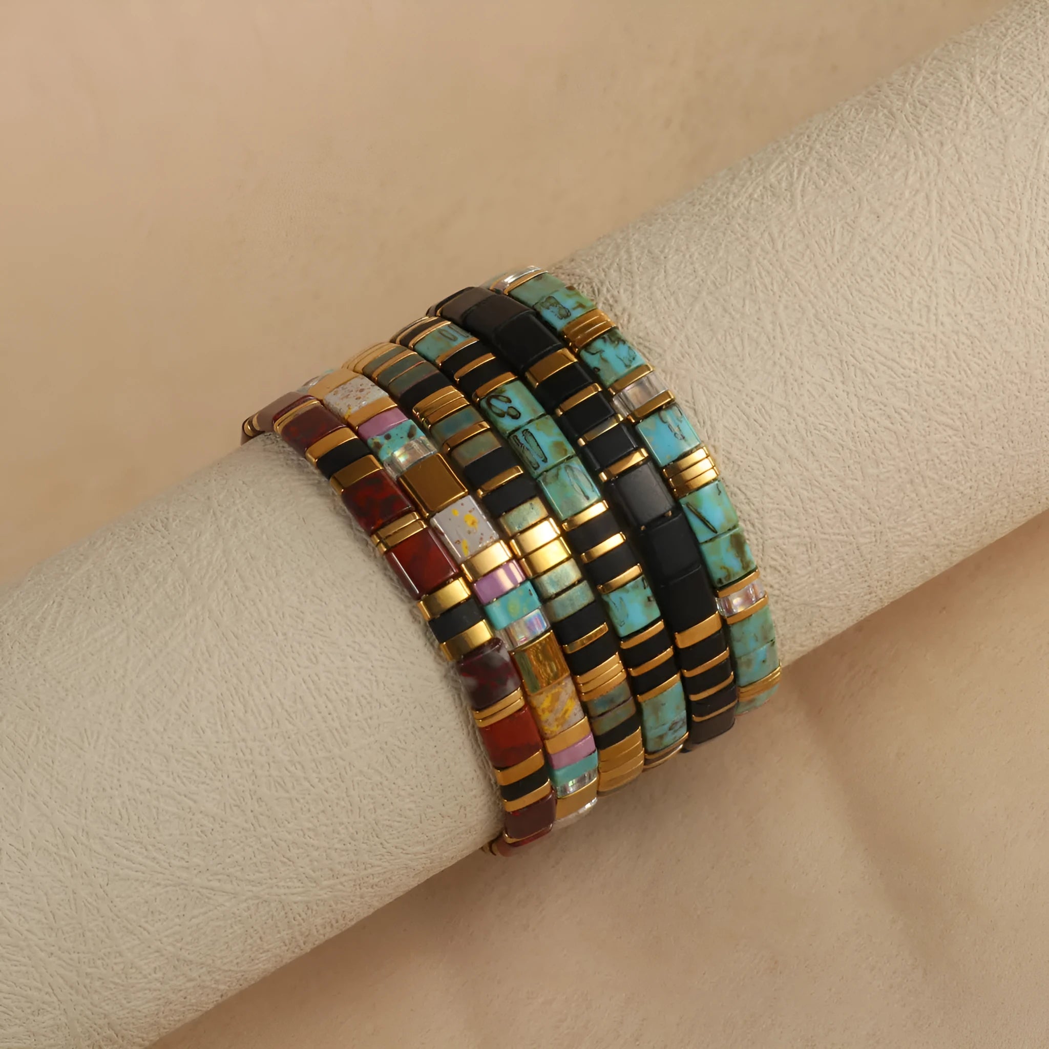 Glass and coloured glaze beaded bracelet with geometric round beads in five colour options
