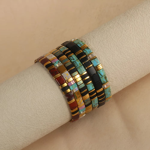 Glass and coloured glaze beaded bracelet with geometric round beads in five colour options