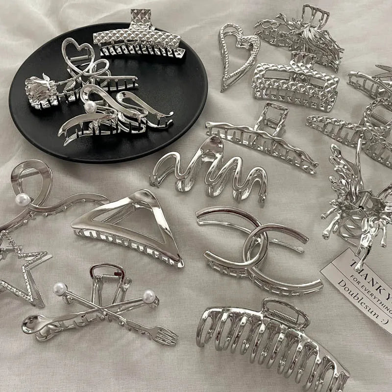 Silver metal hair barrette claw clip with electroplated finish and decorative design