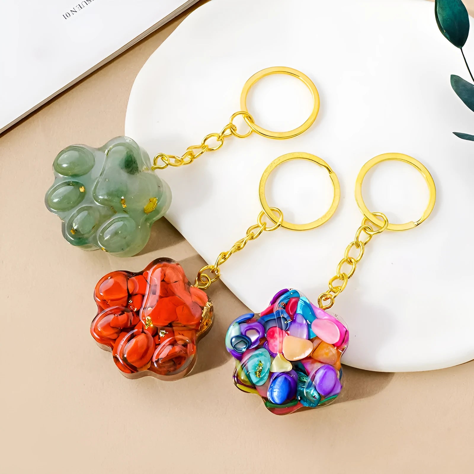 Natural crystal cat's paw keychain pendant charm in one of ten crystal types including pink crystal and amethyst.