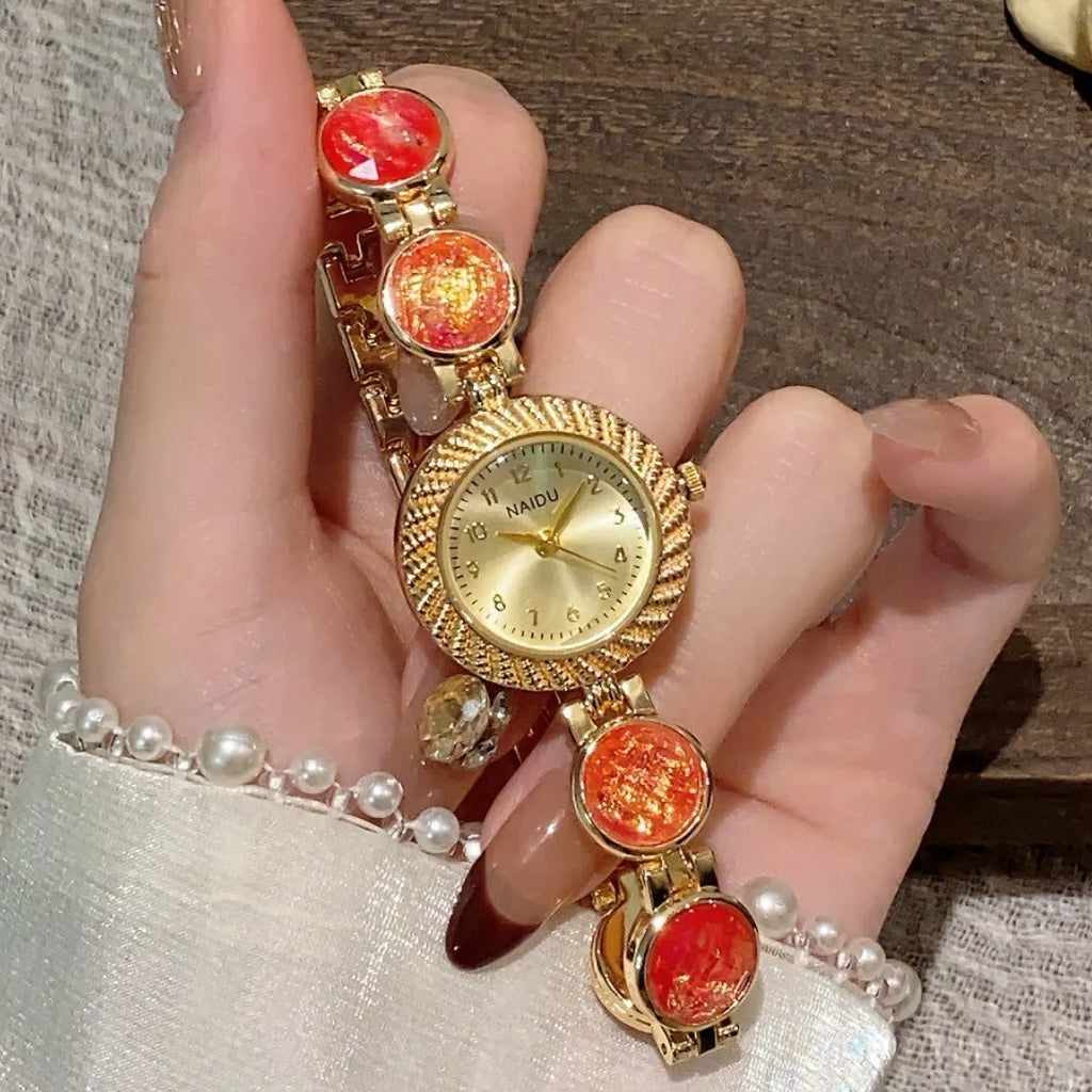 Women's quartz watch with 25mm round dial and zinc alloy case in milky white colour.