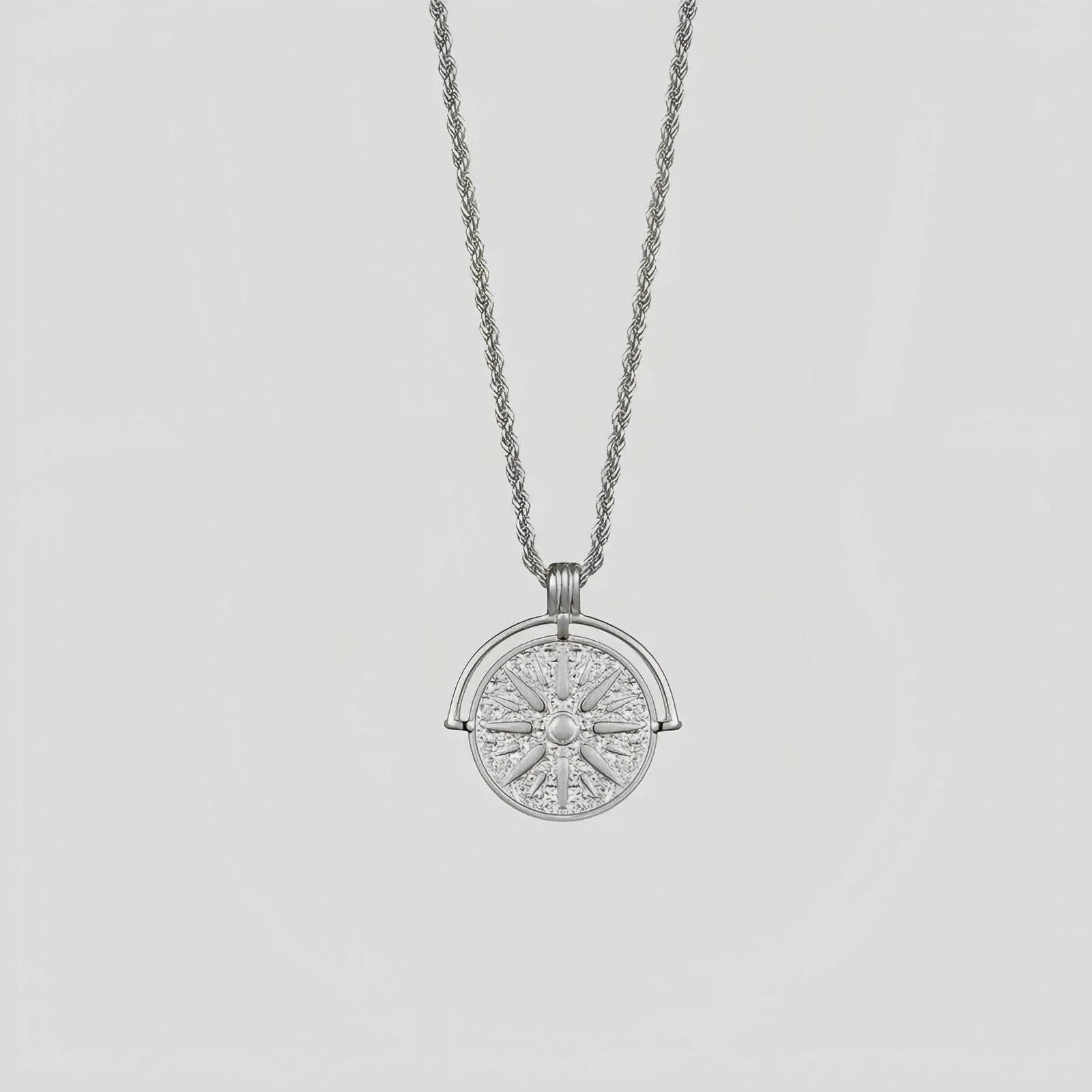 Stainless steel sunflower embossed pendant necklace with geometric star design on adjustable hemp flower chain