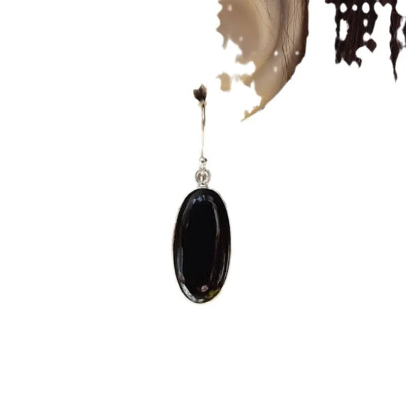 Women's earrings with oval black agate pendants on 925 silver and alloy geometric design