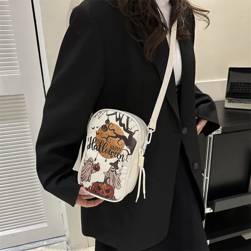 Halloween graffiti crossbody phone bag with pumpkin ghost bat print