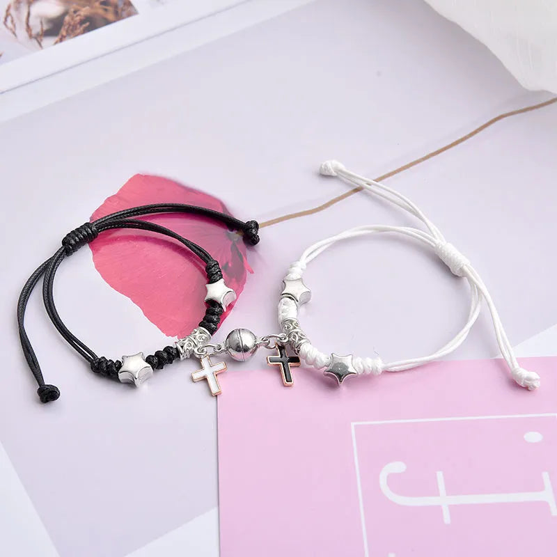 Magnetic couple bracelet pair with alloy electroplating in various designs including clover and crown patterns