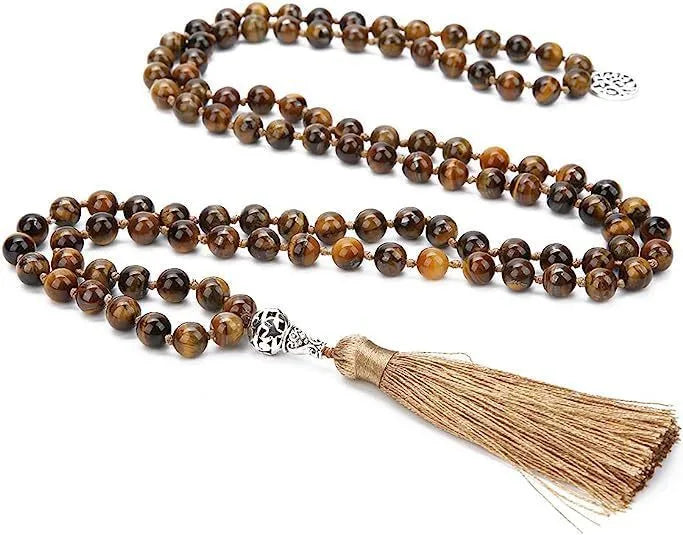 Handmade knotted beaded necklace with stone pendant showing 108 beads and geometric design