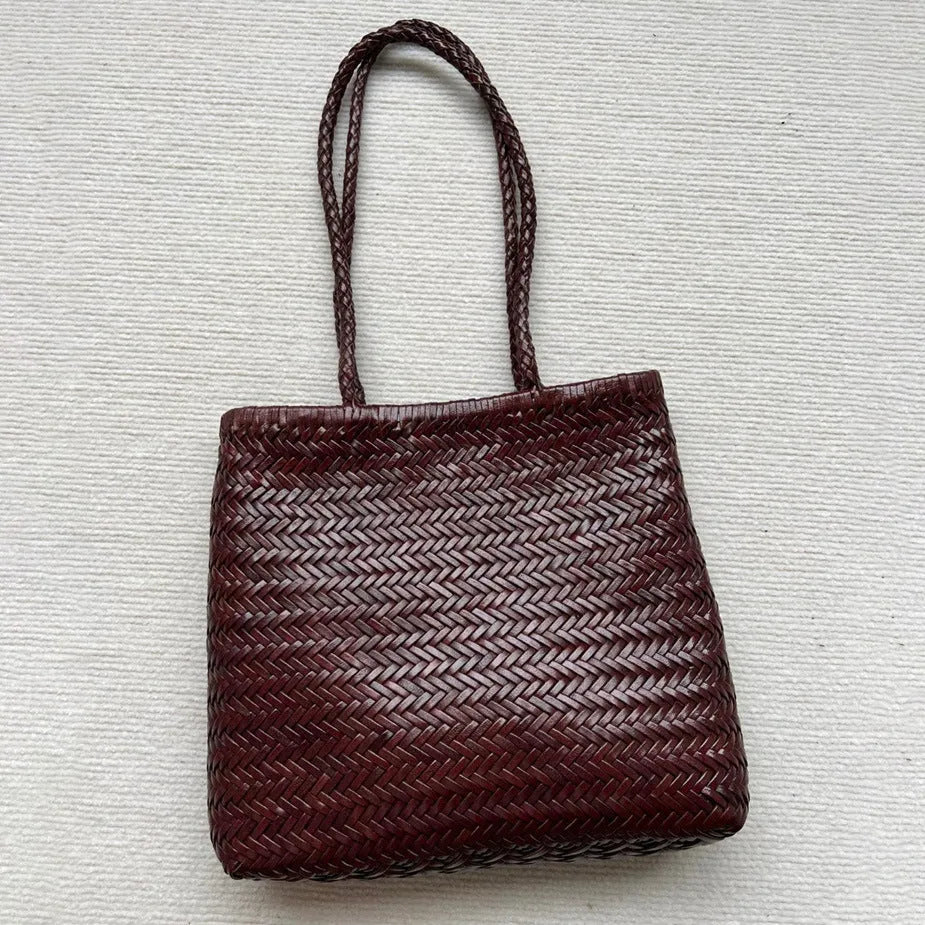 Brown handmade woven leather tote bag with outer pocket