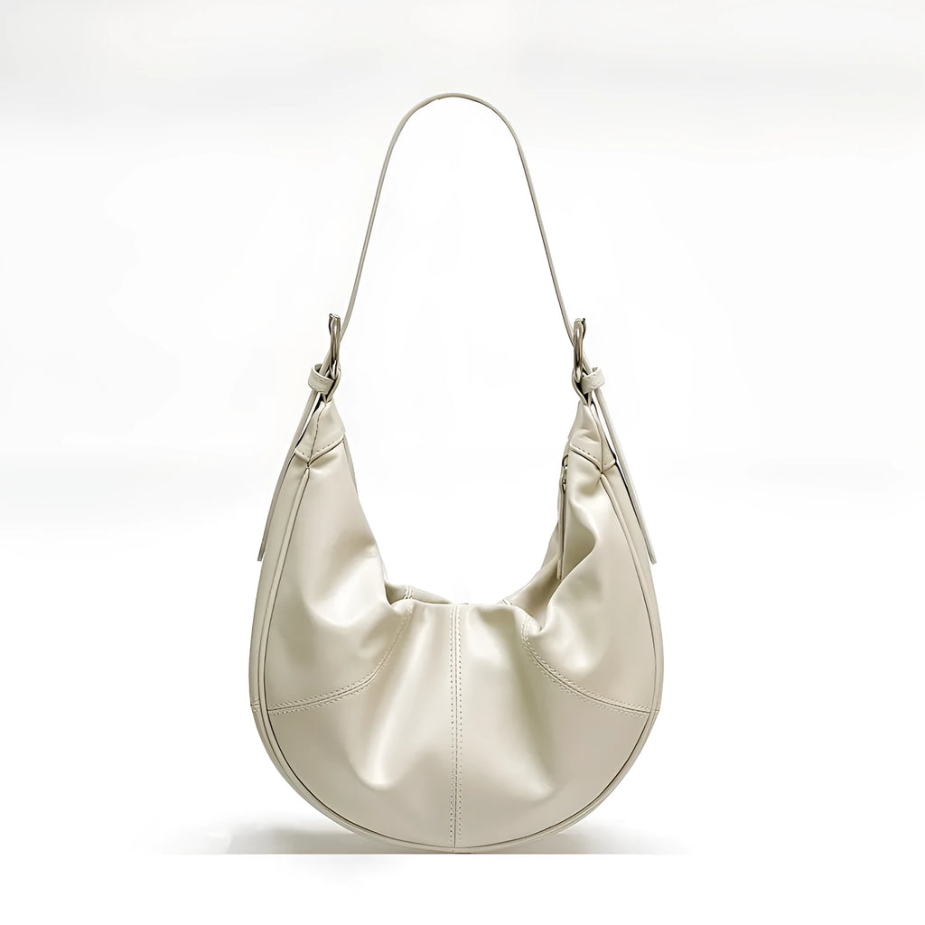 Women's dumpling-shaped shoulder bag in genuine first layer cowhide leather with cotton lining and sandwich pockets