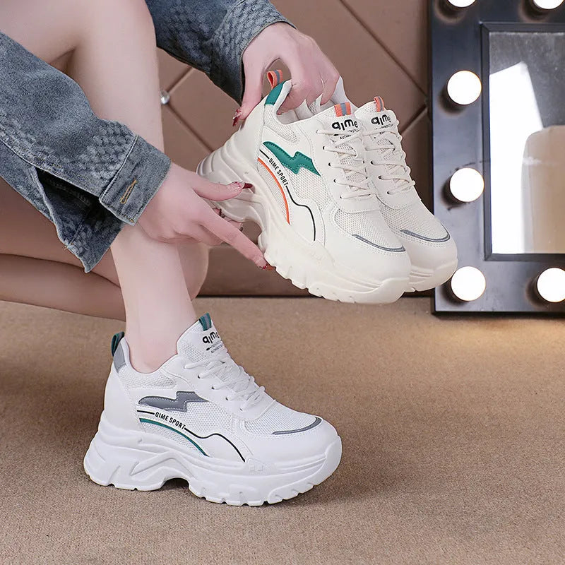 Women's white sports shoes with cross shoulder straps and height increasing insoles
