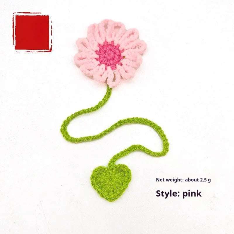 Hand-crocheted wool bookmark with daisy motifs on flexible wire in multiple colour options