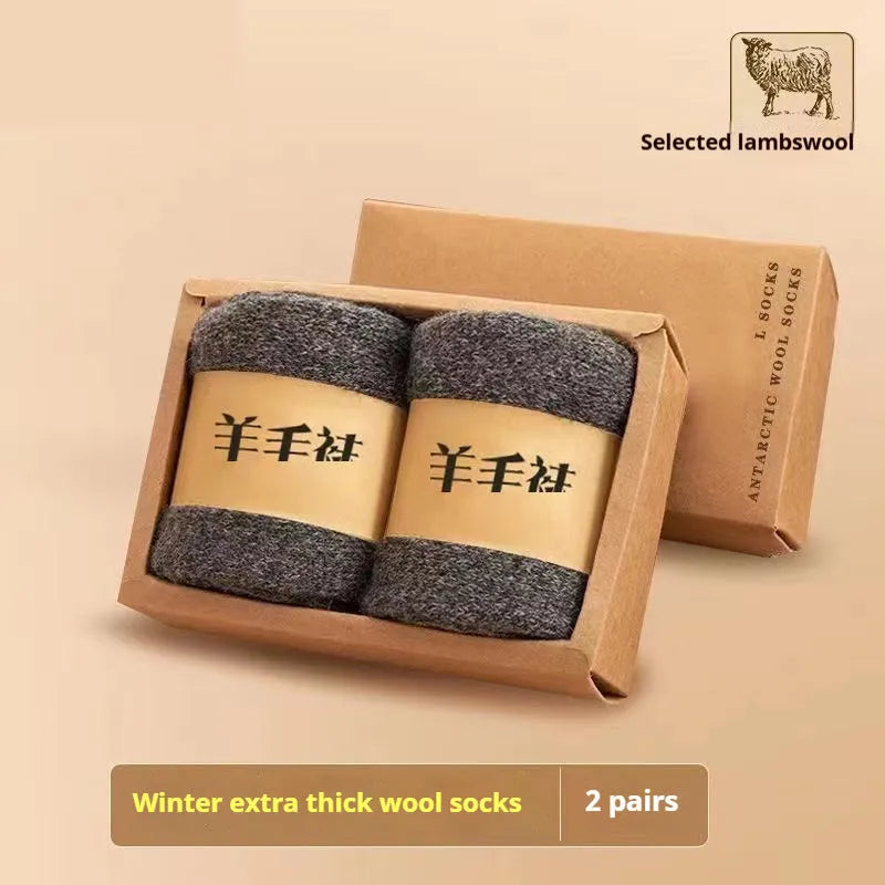 Pair of thick cotton winter socks in a solid colour, presented in a box.