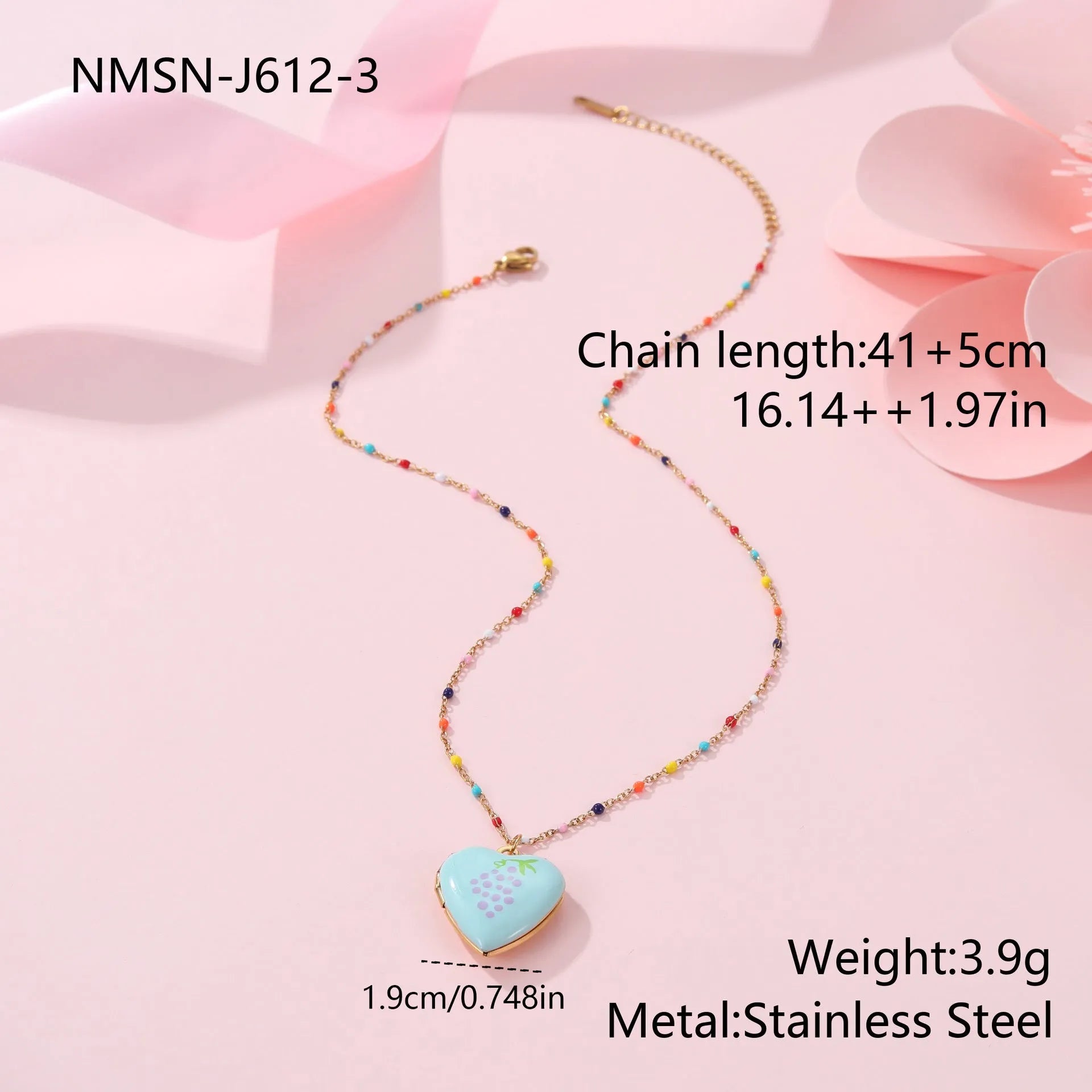 Gold-plated heart-shaped fruit pendant necklace on a stainless steel chain, showing grape design detail.