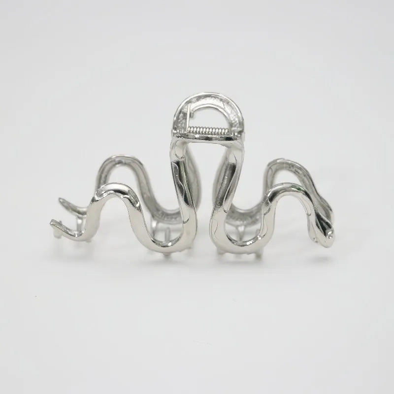 Slytherin serpentine metal hair barrette measuring 10.5 cm with electroplated finish