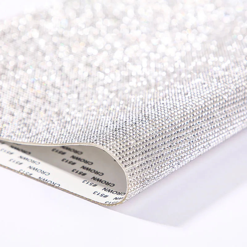 Rhinestone adhesive sheet with eight-eye pattern in multiple colour options on white background