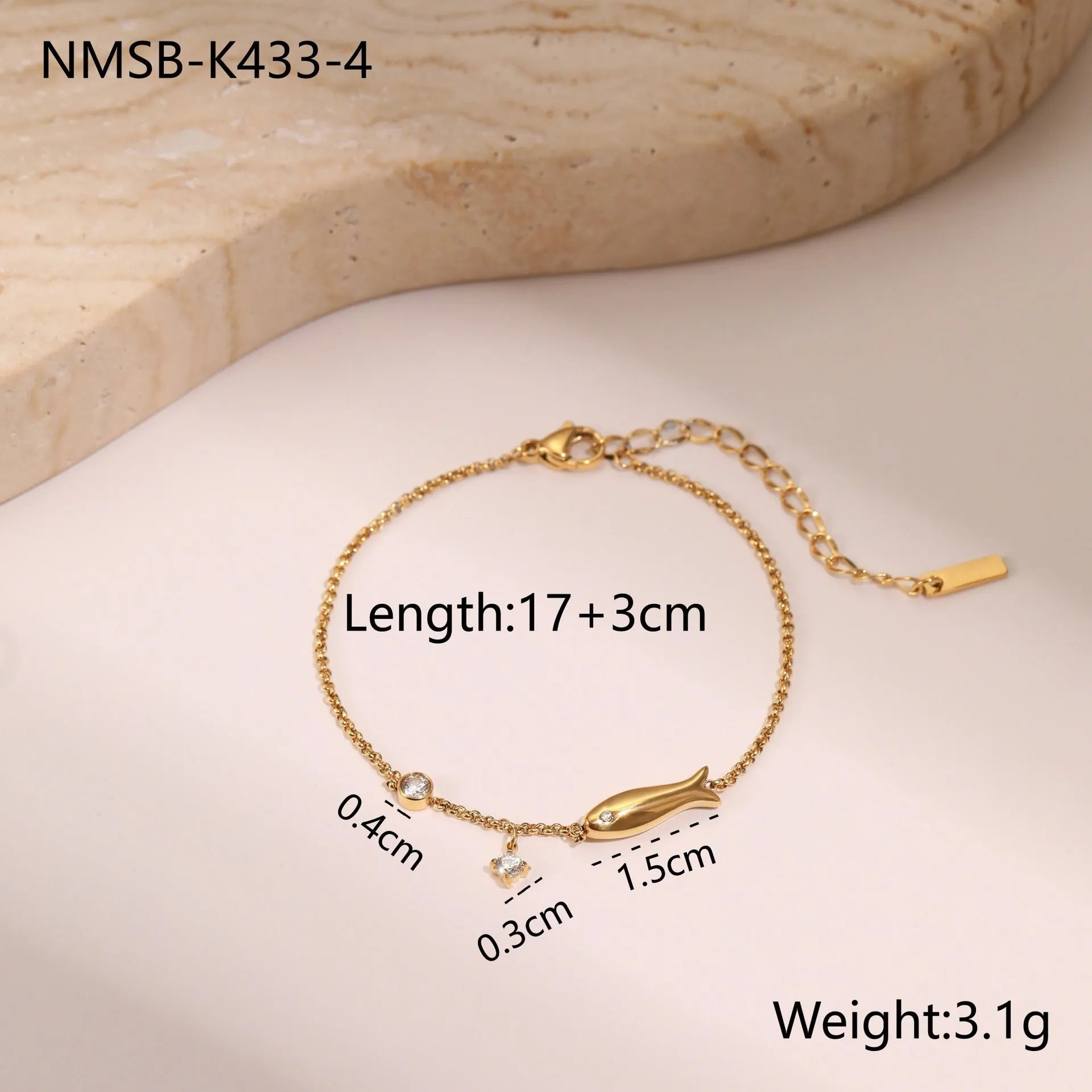 Women's stainless steel bracelet with 18K gold plating and a geometric zircon star pendant on wrist.