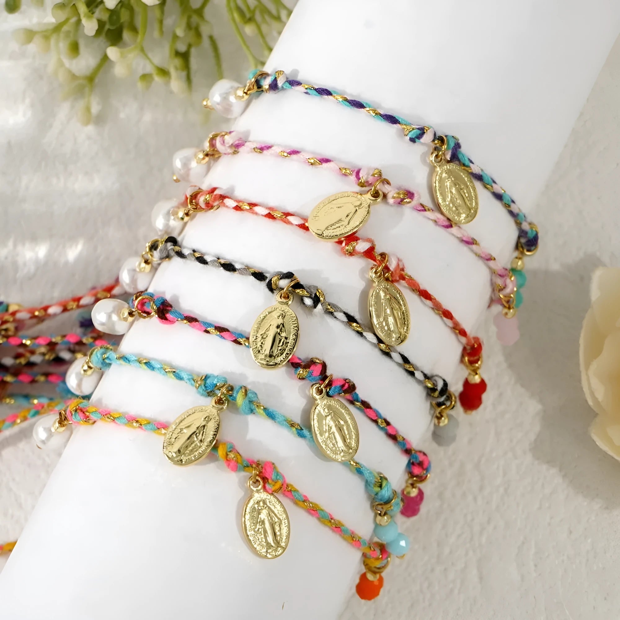 A colourful hand-woven braided rope bracelet for women in an ethnic strap tag style.