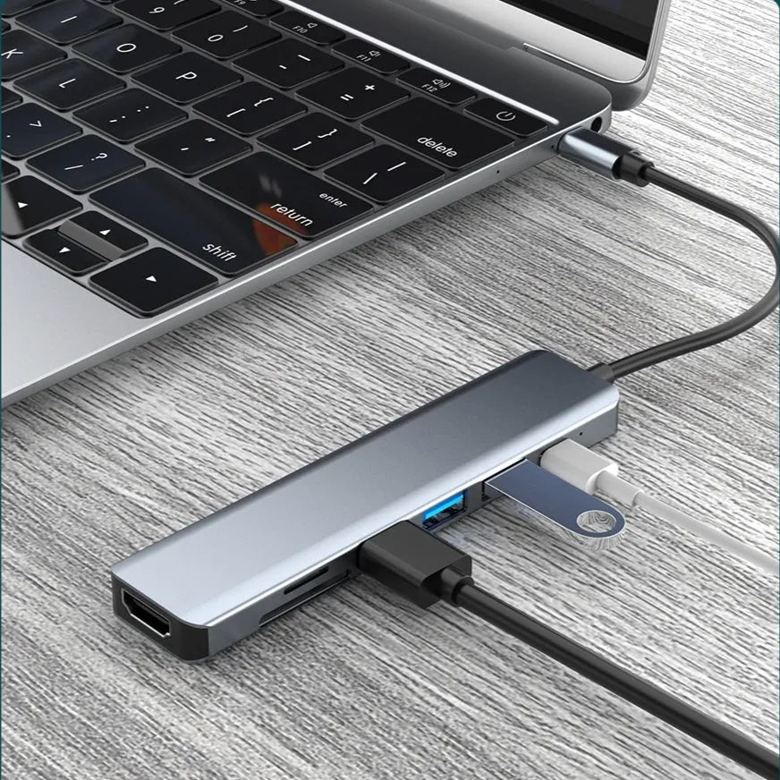 Seven-in-one Type-C USB expander hub with 14.5cm cable showing multiple interface ports
