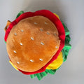 Cat wearing adjustable burger headdress collar with printed food details