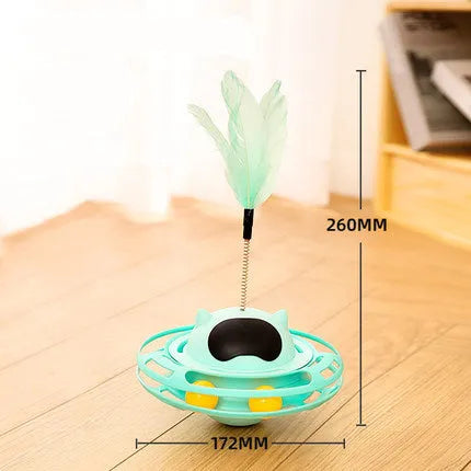 Pink stick-shaped cat toy turntable tumbler with self-hi feature on flat surface
