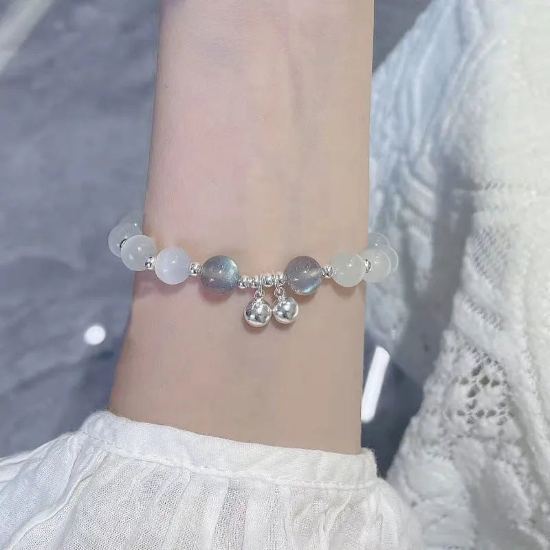 Handmade Chinese style glass bracelet with bamboo joint beads in a red Lvzhu Duobao design.
