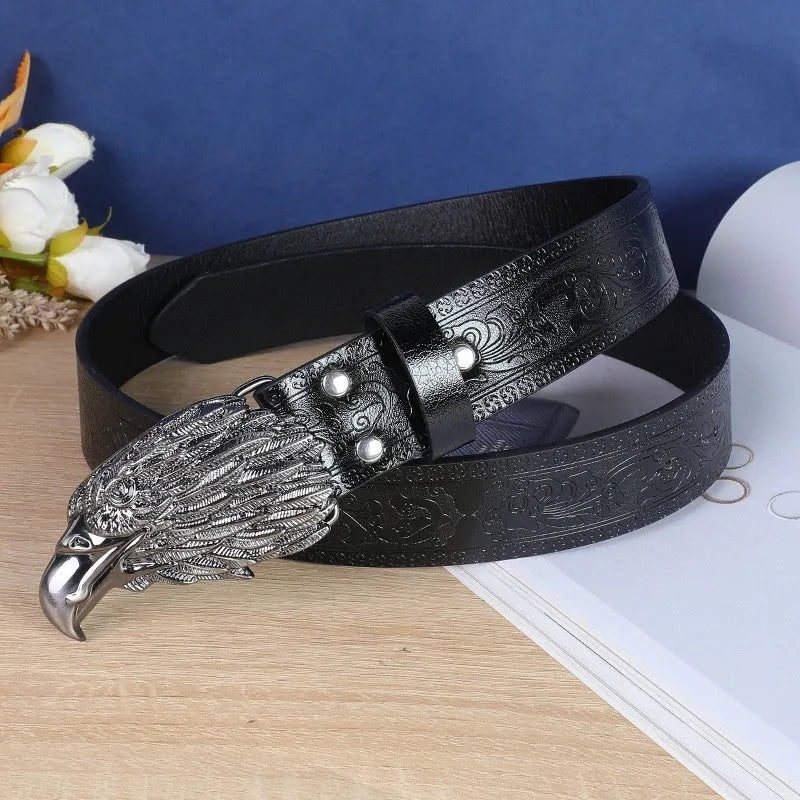 Men's black imitation leather belt with decorative alloy cow head buckle and pin buckle fastening
