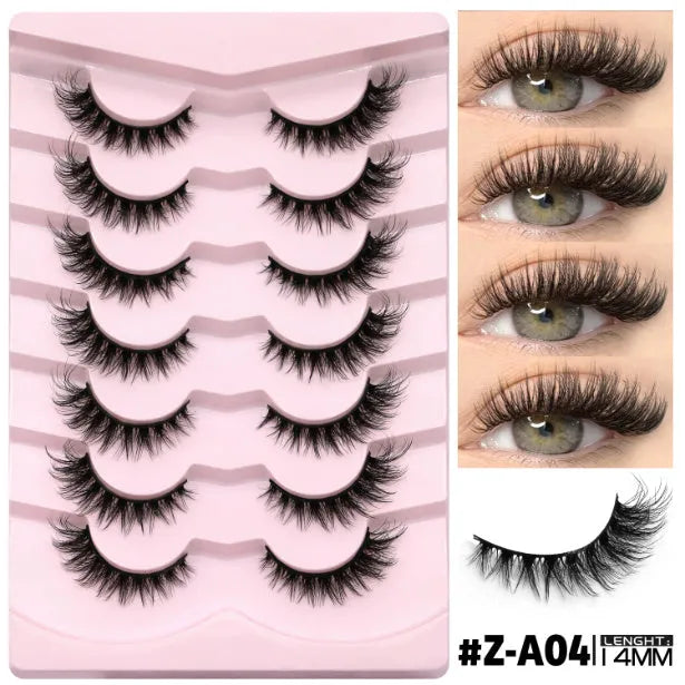 False eyelashes without eyeliner in thick natural long artificial fibre style with adhesive