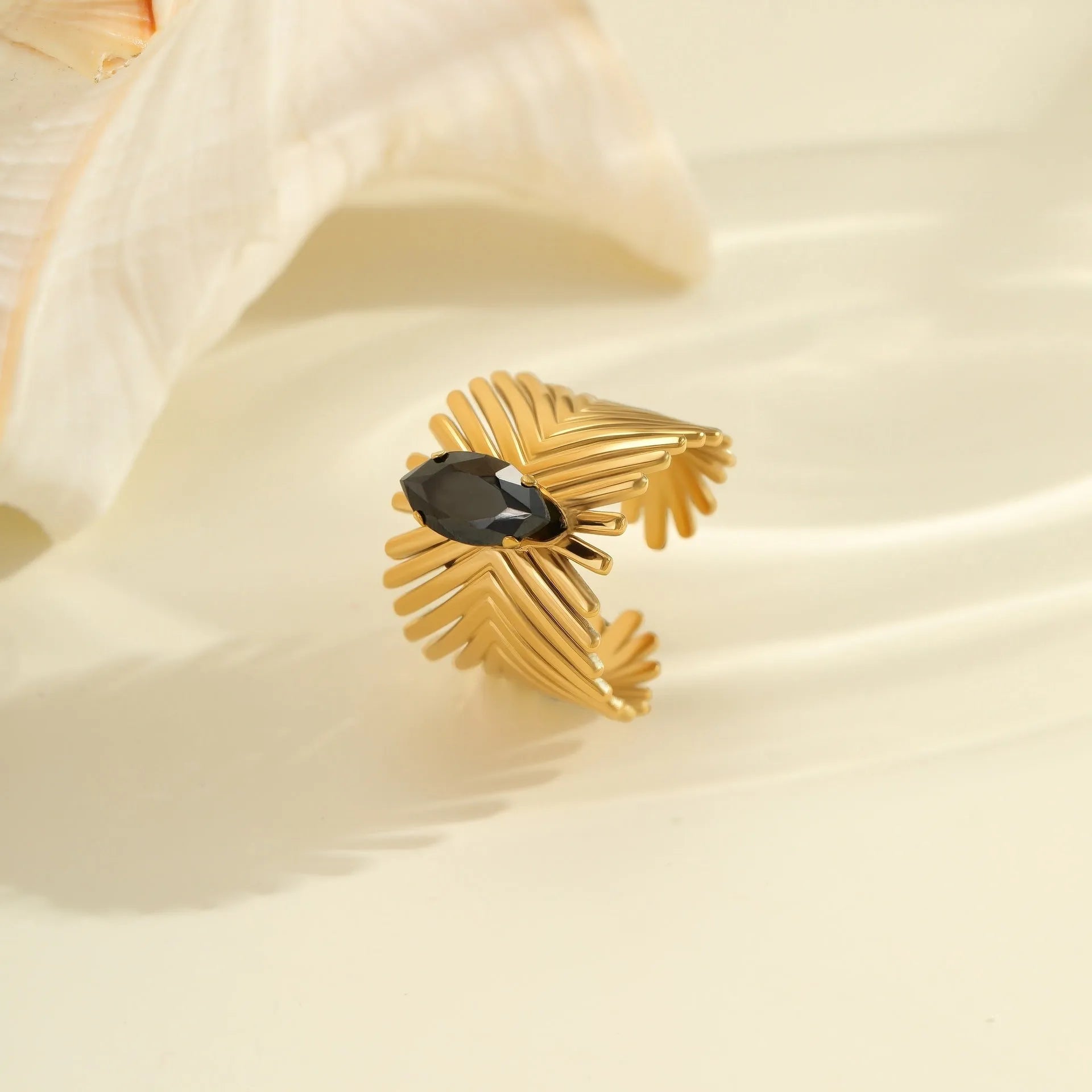 Geometric open mouth adjustable ring with inlaid zircon detailing on electroplated stainless steel
