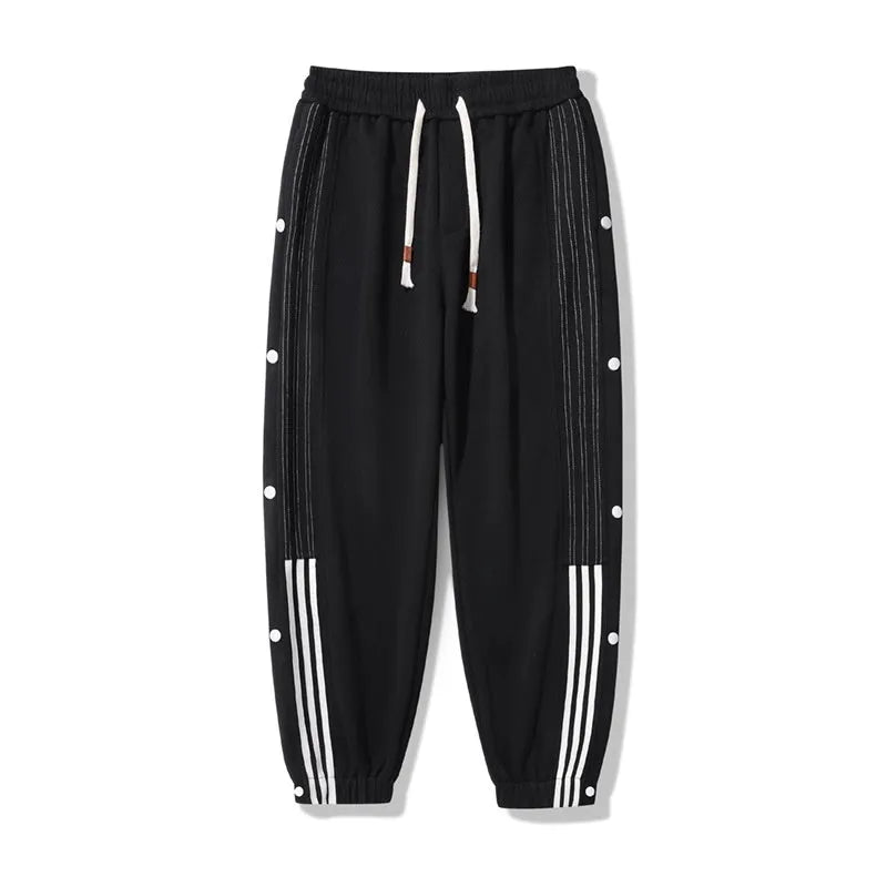 Men's loose fit cotton blend sports trousers with ankle tie fastenings and drawstring waist