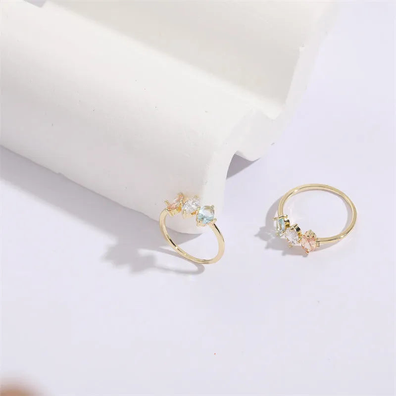 Mother's Day birthstone ring with triangle horse eye design and tricolor zircon stones in 14K gold plate.