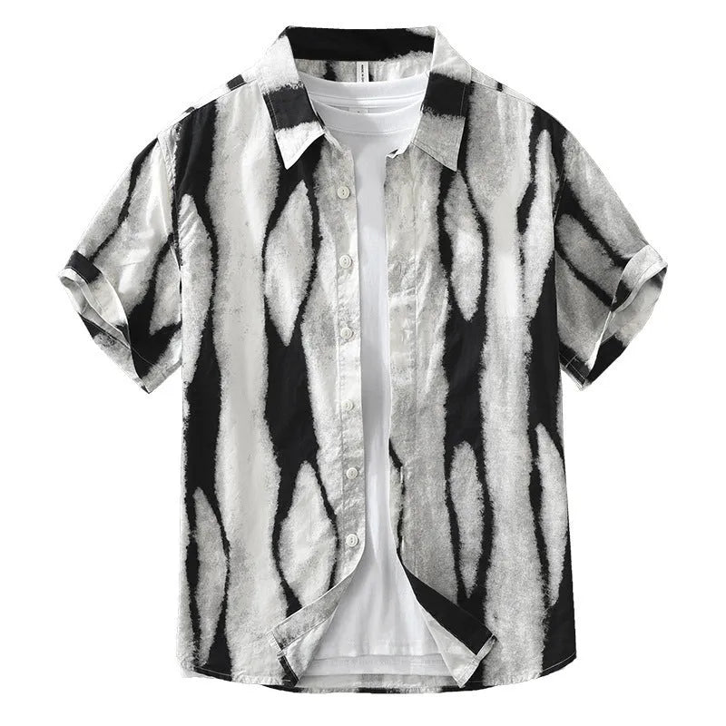 Man wearing a black and white striped pure cotton short sleeve shirt with a loose cardigan fit.