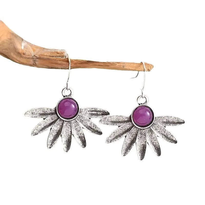 Purple Bohemian zodiac animal earrings with resin gemstone details on alloy base