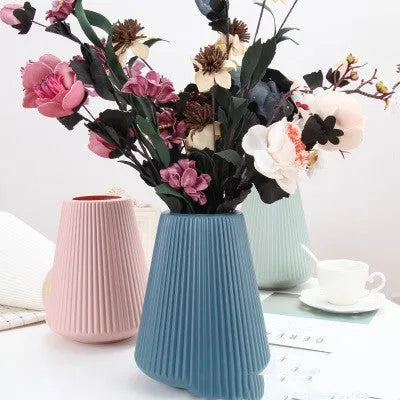 Colourful melamine plastic desktop flower vase in simple style, shown in blue, green, pink, and white colour options.