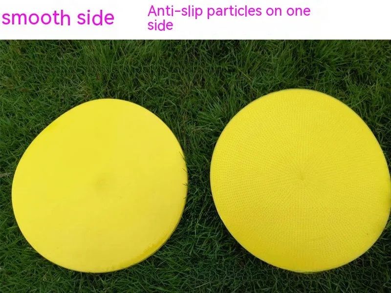 Soft yellow TPE football training landmark pad on grass, showing 23cm diameter.