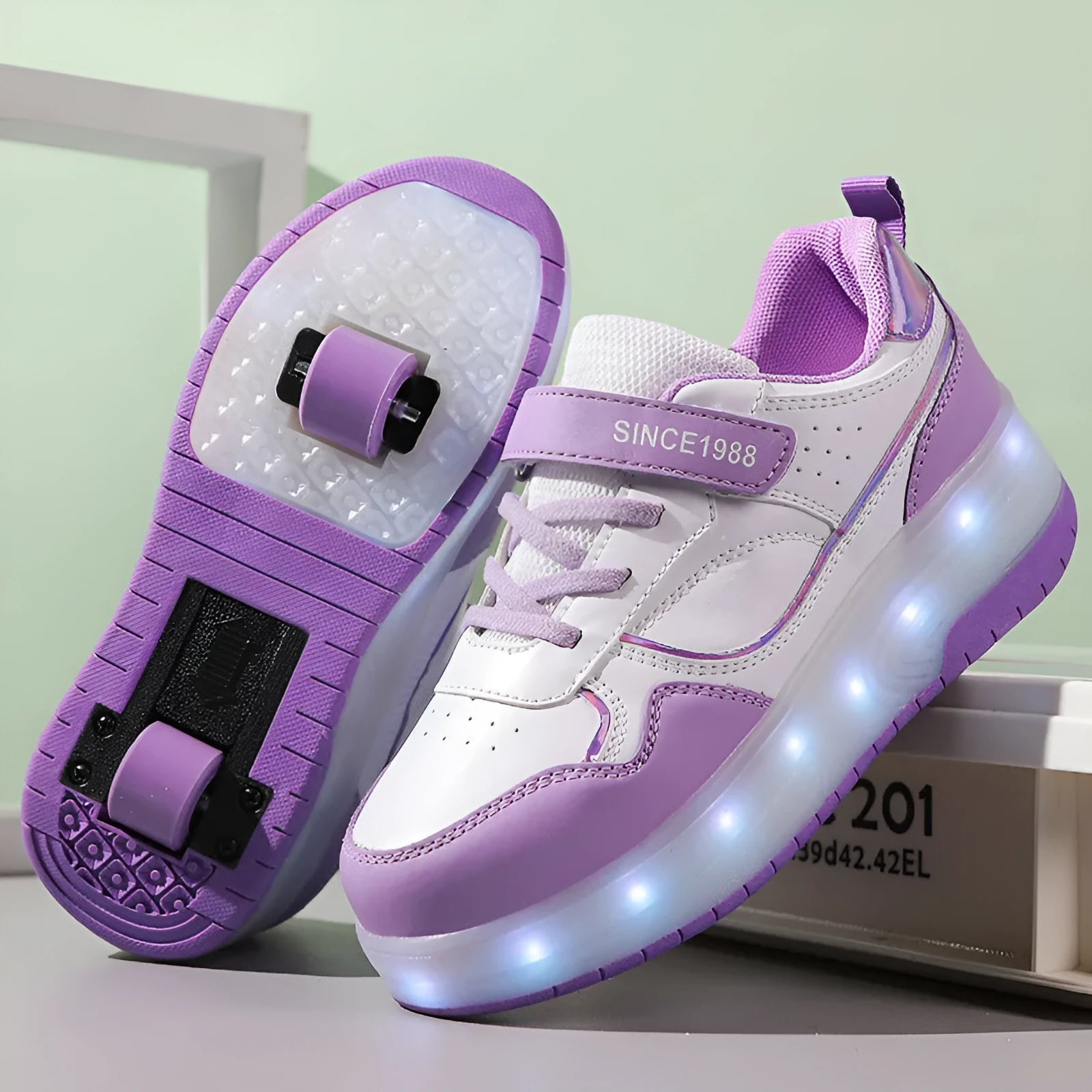 Children's rechargeable roller skates with flashing LED light-up wheels in pink, white, black, and purple colours.