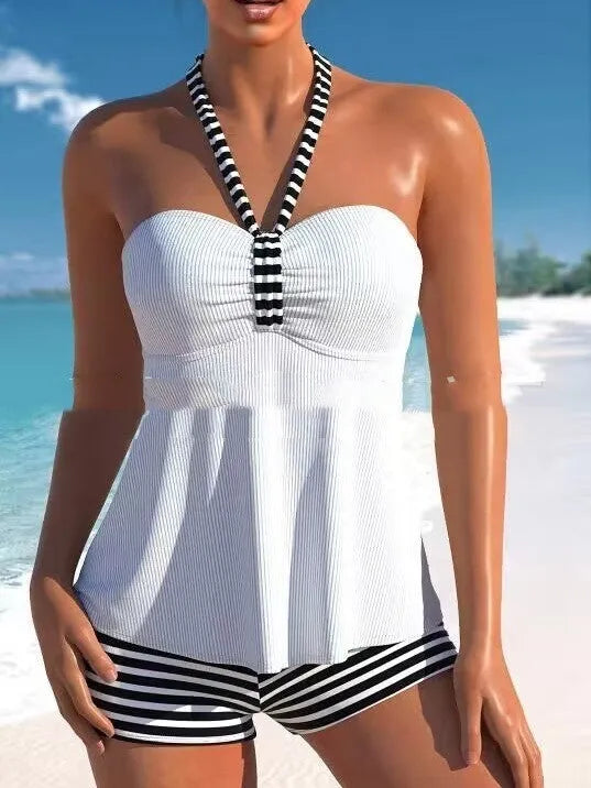 Women's solid colour striped off-shoulder one-piece swimsuit on a mannequin, showing the briefs style and removable lining.